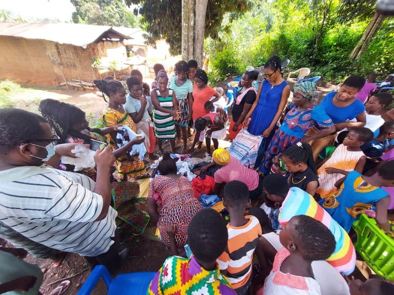 Mother and child receiving healthcare support in rural Africa
